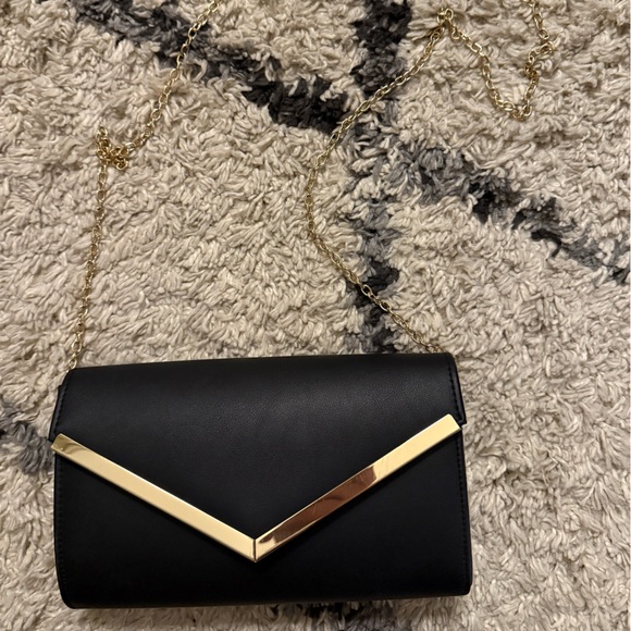 Black Clutch and Purse in One with Gold Accent - Picture 2 of 3